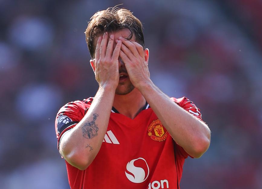 Mason Mount of Manchester United looking dejected on the field.