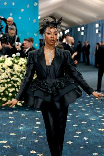 Ego Nwodim at the Met Gala in a black suit.