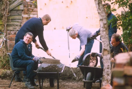 Forensic investigators sifting through soil.
