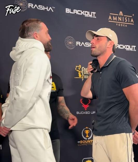 Jack Fincham and Aaron Chalmers face off.