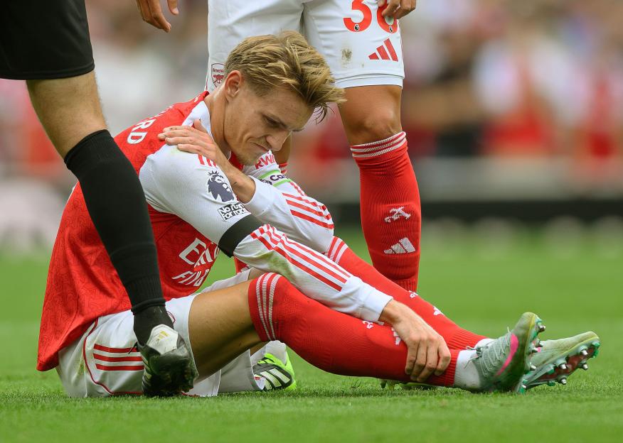 Martin Ødegaard injured on the field.