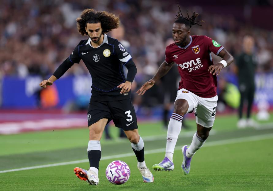 Marc Cucurella of Chelsea controlling the ball during a Premier League match.