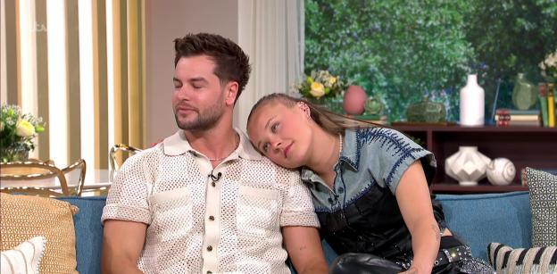Chris Hughes and JoJo Siwa on a talk show.
