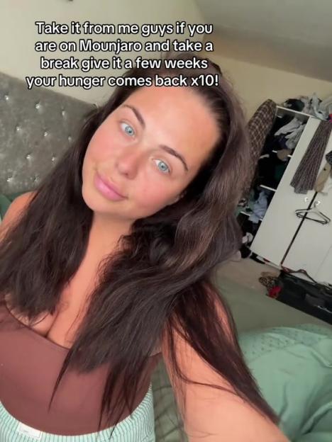 A woman with long dark hair and light blue eyes warns viewers about increased hunger after pausing Mounjaro medication.