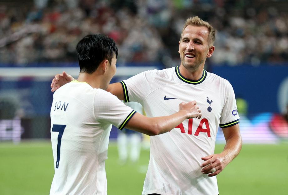 Heung-Min Son celebrates scoring his sixth goal with Harry Kane.