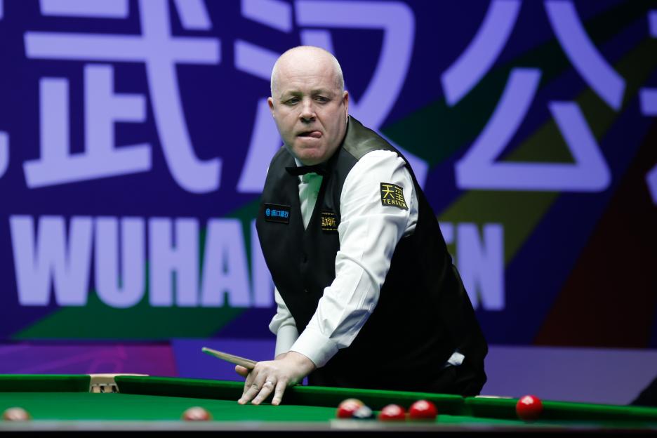 John Higgins of Scotland playing snooker.