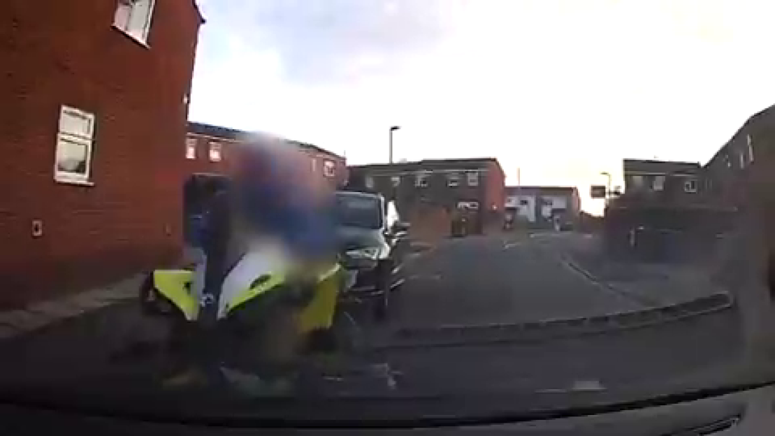 Dashcam footage of a quad bike ramming a police car.