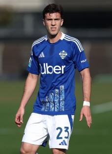 COMO, ITALY - MARCH 29: Maximo Perrone of Como 1907 looks on during the Serie A match between Como 1907 and Empoli FC at Stadio G. Sinigaglia on March 29, 2025 in Como, Italy. (Photo by Marco Luzzani/Getty Images)