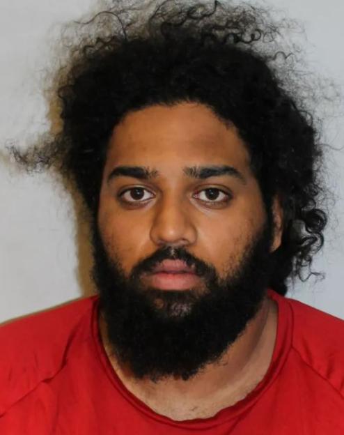 Mugshot of Adlan Haji.