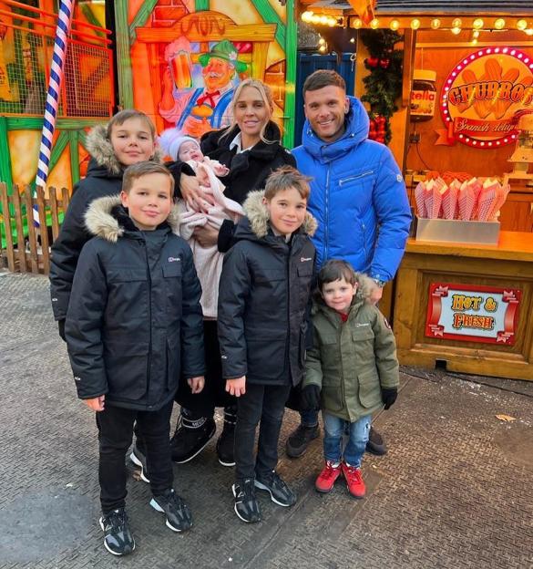 Danielle Lloyd with her husband and four children.