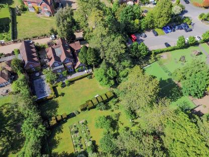 ‘Nuisance’ kids who kick footballs over garden walls are breaking the LAW, High Court rules after couple sued next-door