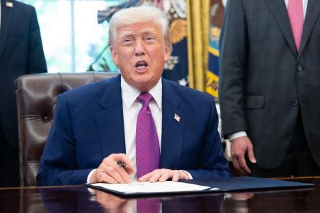 President Trump signing an executive order.