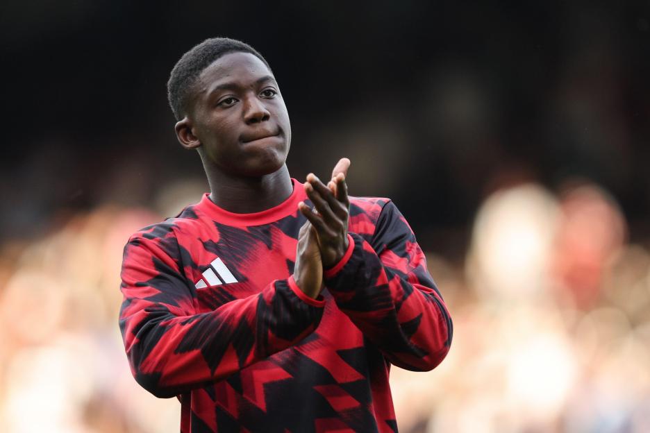 Kobbie Mainoo of Manchester United applauding fans.