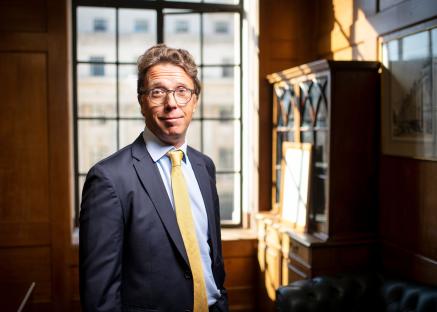 Portrait of Michael Saunders of the Monetary Policy Committee in his Bank of England office.