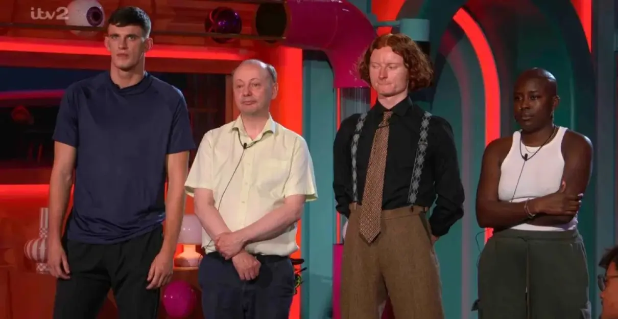 Four contestants on a reality show stand under red and teal lighting.