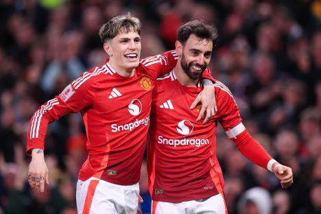 Manchester United's Bruno Fernandes and Alejandro Garnacho celebrating a goal.
