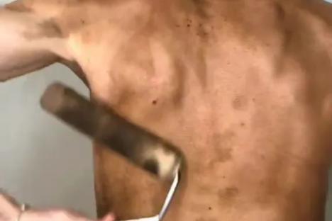 Forget awkward mitts – women are now using paint ROLLERS to fake tan their backs and it works wonders