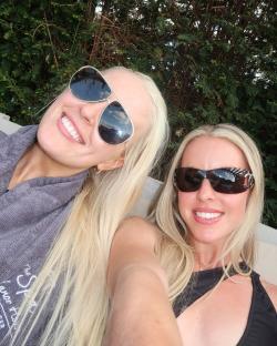 Selfie of two blonde women wearing sunglasses.
