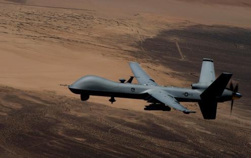 F4GYCB An MQ-9 Reaper UAV drone in flight at Creech Air Force Base October 17, 2015 in Indian Springs, Nevada.
