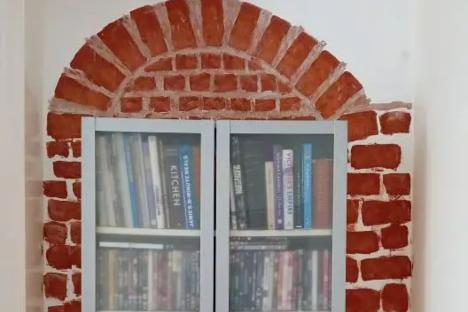 Lad shares £10 DIY makeover using tester paints to recreate posh wallpaper – but his ‘wonky’ bricks are bothering people