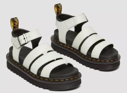 Pair of white Dr. Martens Blaire Athena leather sandals.