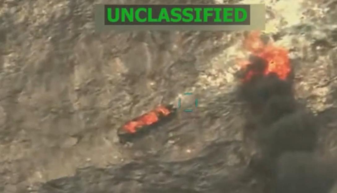 Screen grab from a video shows an exploding boat.