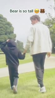 Liam Payne and his son Bear walking hand-in-hand.