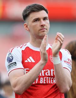 Kieran Tierney of Arsenal applauding fans.