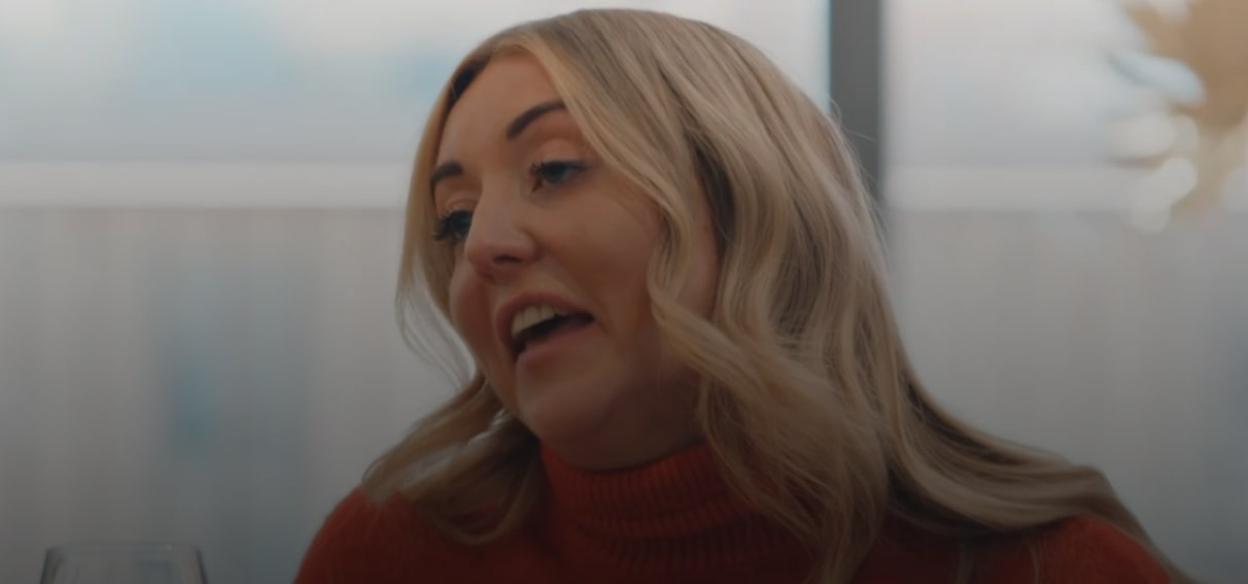 Sarah from MAFS UK in a coral turtle-neck top.