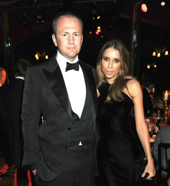 Boris Rotenberg and Karina Rotenberg at a formal event.