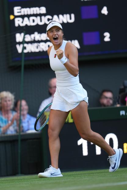 Emma Raducanu celebrates during her second round match at Wimbledon.