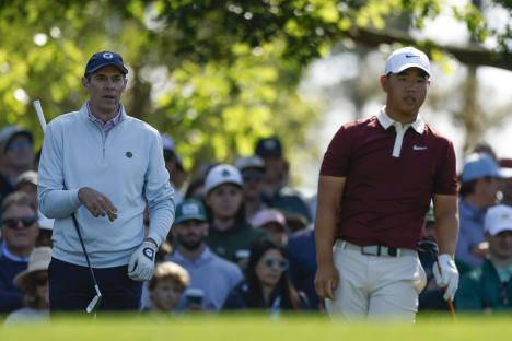 Michael McDermott and Tom Kim at the Masters Tournament.