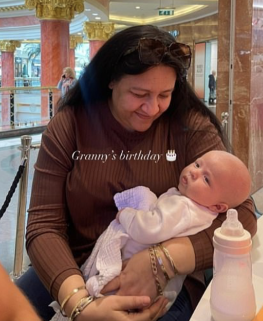 Chantal Fury holding her grandson on her birthday.