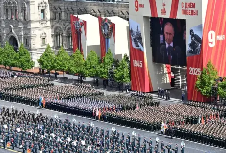 Aerial view of a large military parade in Red Square, Moscow.