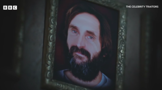 Framed portrait of a man from The Celebrity Traitors.