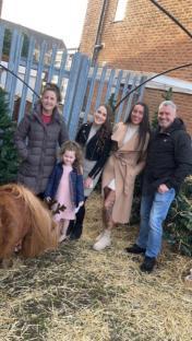 Family photo with a pony.
