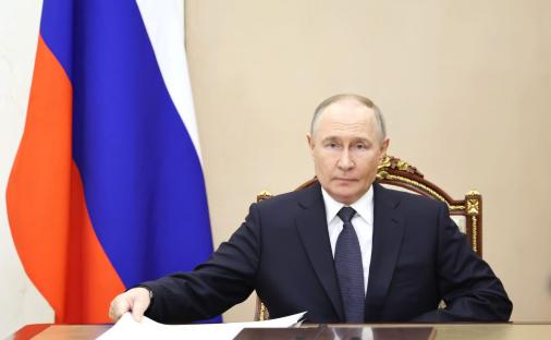 Vladimir Putin at a meeting in the Kremlin.