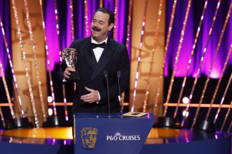 Danny Dyer accepting a BAFTA award.