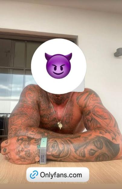 Photo of a man's tattooed arms and chest; his face is obscured by a devil emoji. OnlyFans.com is visible at the bottom.