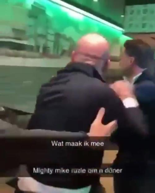 Michael Van Gerwen fighting