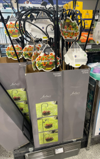 Hanging basket stakes with flowers.