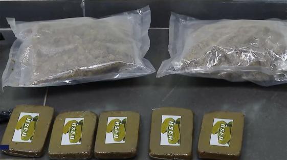 Seized cannabis: two bags and five blocks of hash.