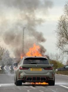 A BMW car on fire.