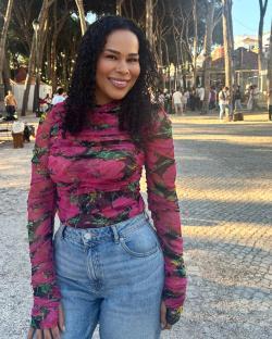 Amerley Ollennu in a floral top and jeans.