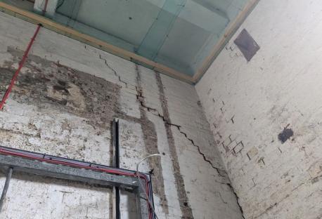 Cracked wall in a building.