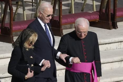 President Biden and his wife at a funeral.