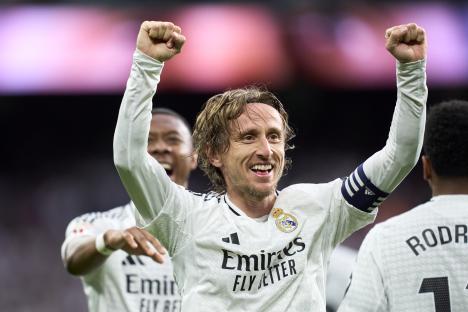 Luka Modric of Real Madrid celebrating a goal.