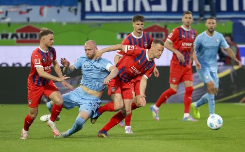 Soccer players in action during a match.
