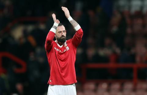 Steven Fletcher of Wrexham AFC applauding after a match.