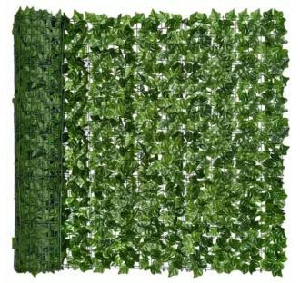 Artificial green leaf fence panel rolled up.
